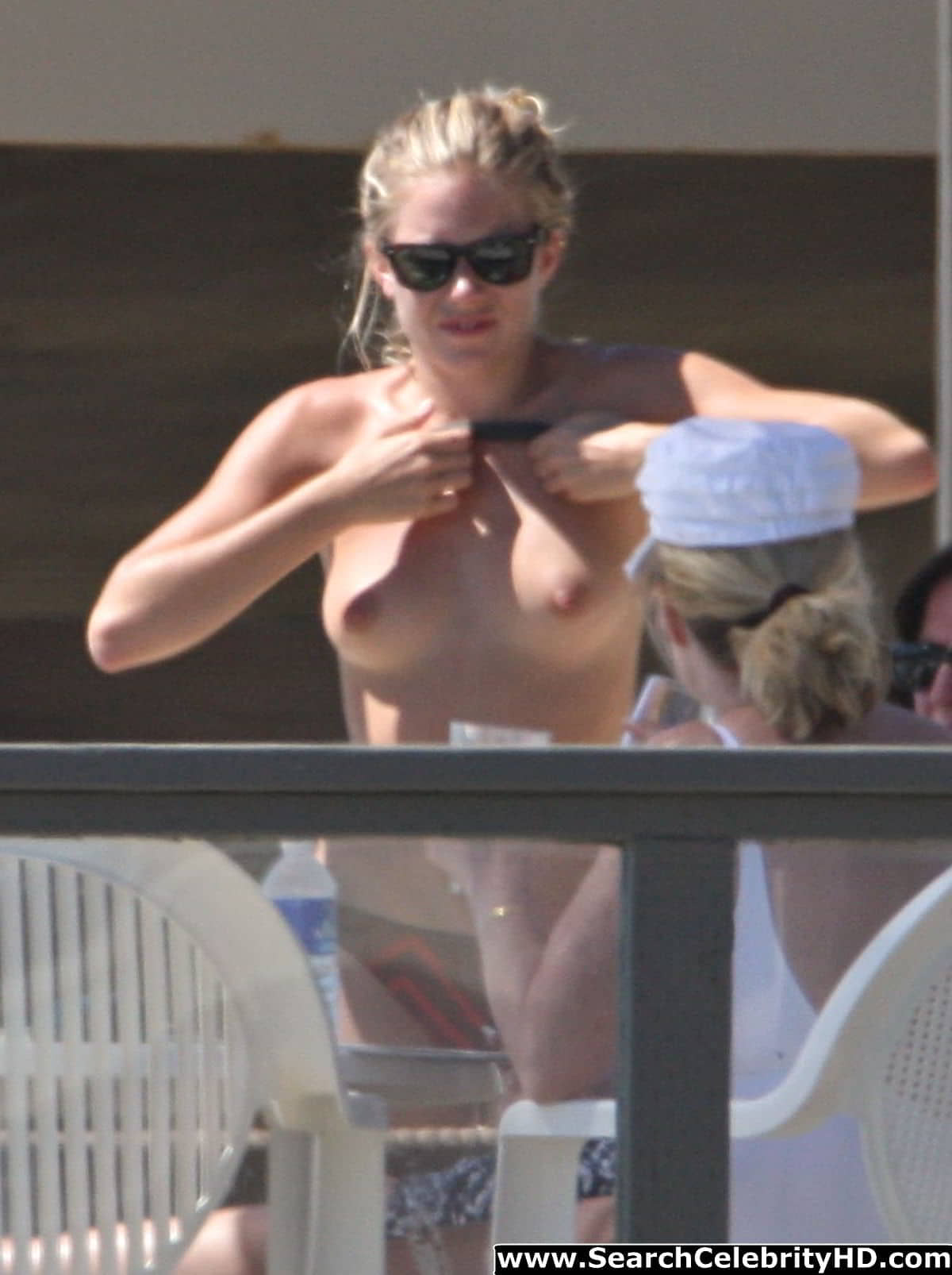 Sienna Miller – Topless and Bikini Malfunction Candids